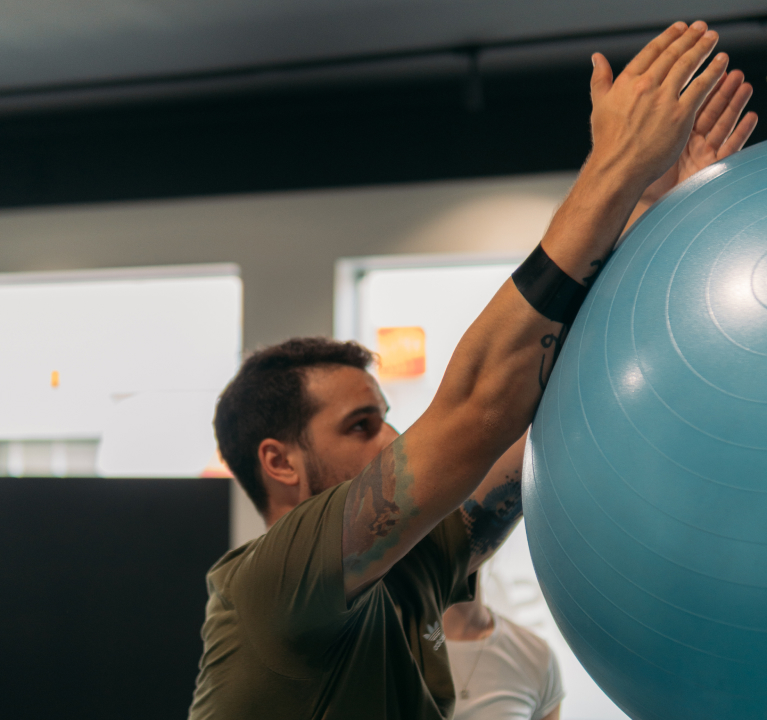 Image of mobility exercises with a ball.