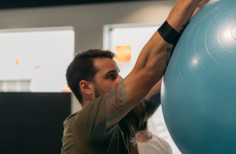 Image of mobility exercises with a ball.