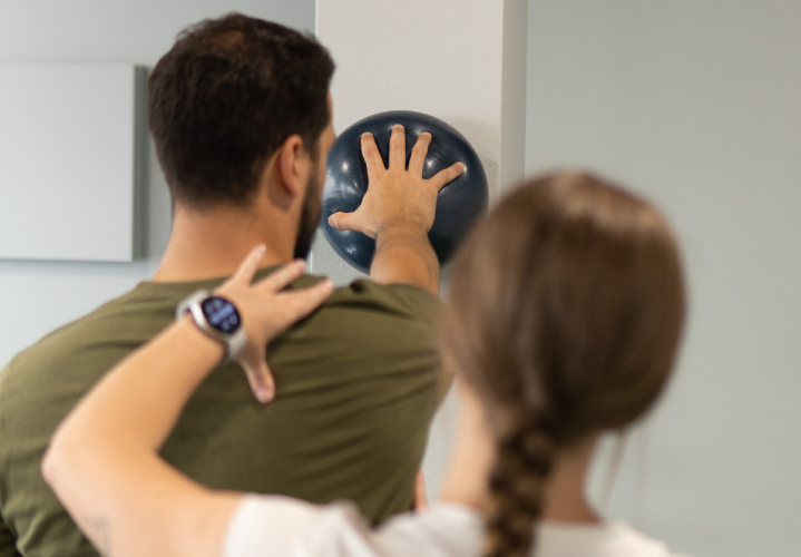 Image of mobility exercises with a ball.